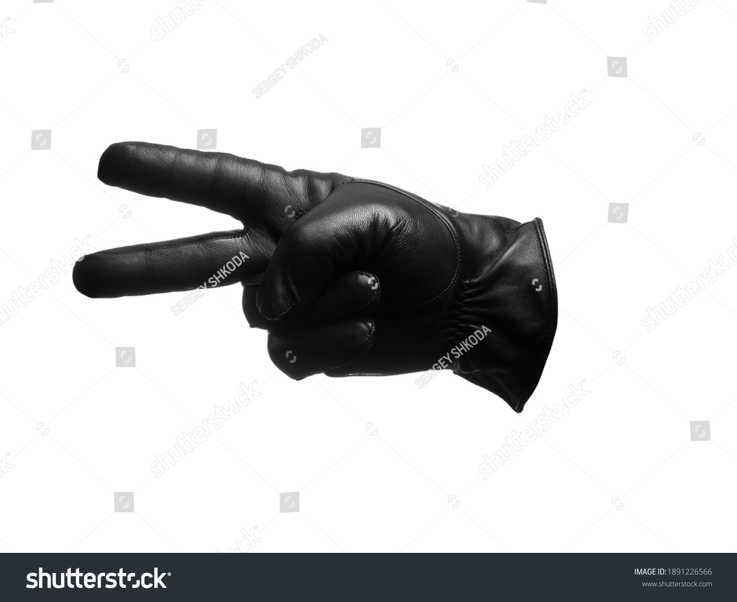 black leather glove shows two fingers gesture. isolated white background. #1891226566