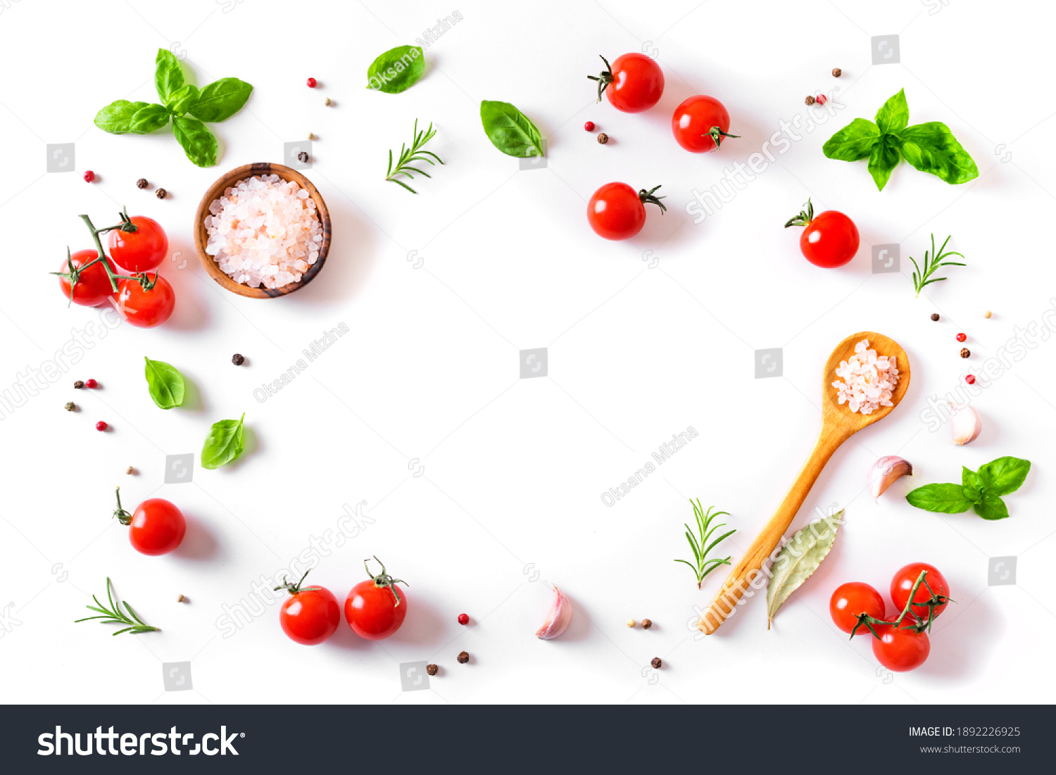 Fresh tomatoes, basil, sea salt and spices frame isolated on white background. Healthy food and vegan raw eating concept, creative flat lay. #1892226925