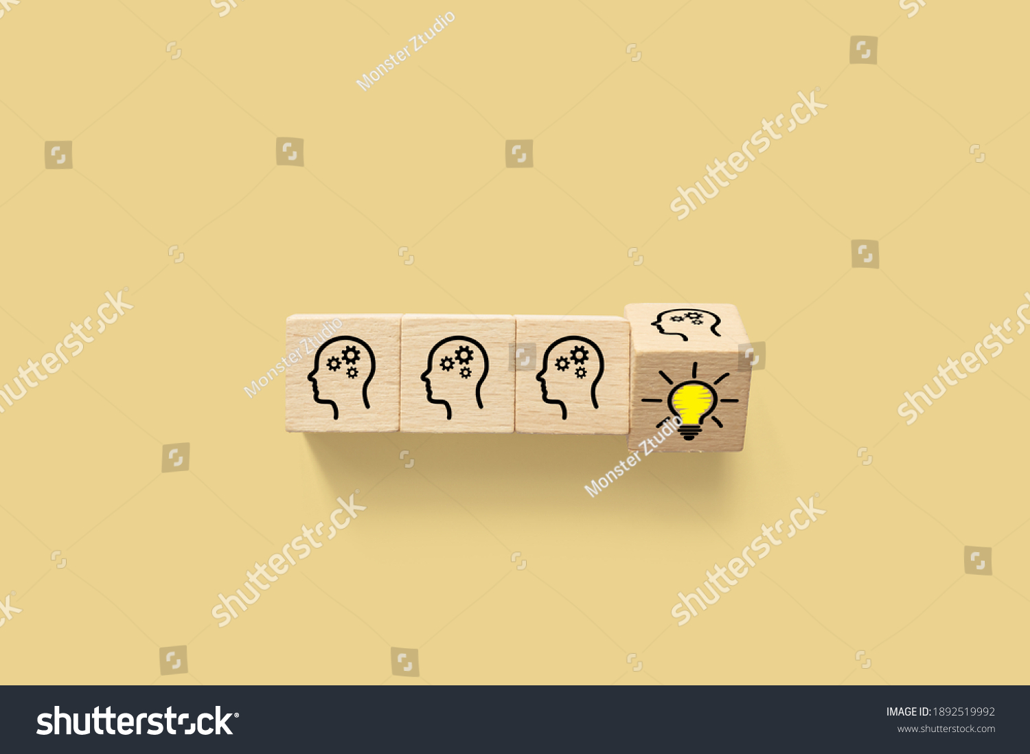 Concept creative idea and innovation. Wooden cube block with head human symbol and light bulb icon #1892519992
