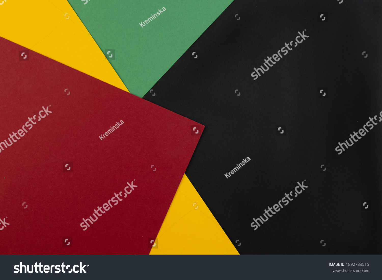 February Black History Month. Abstract Paper geometric black, red, yellow, green background. Copy space, place for your text. Top view. #1892789515