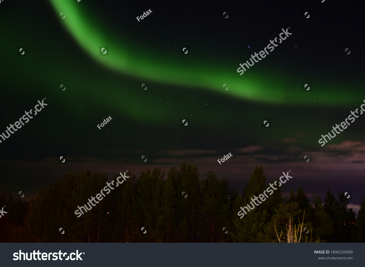 Northern lights in the village Vysoky, Russia #1896339589