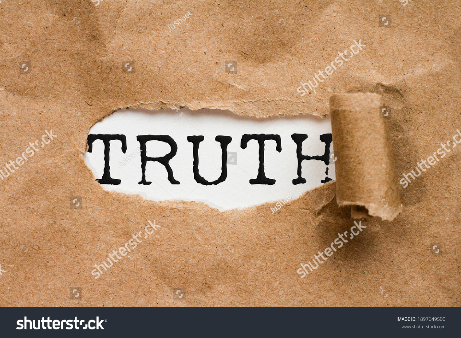 Truth. the word "truth" appears in a hole in a file. revelation of hidden facts #1897649500