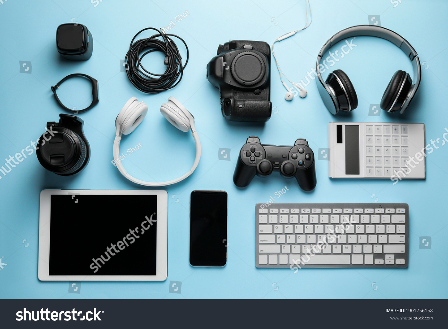 Different modern devices on color background #1901756158