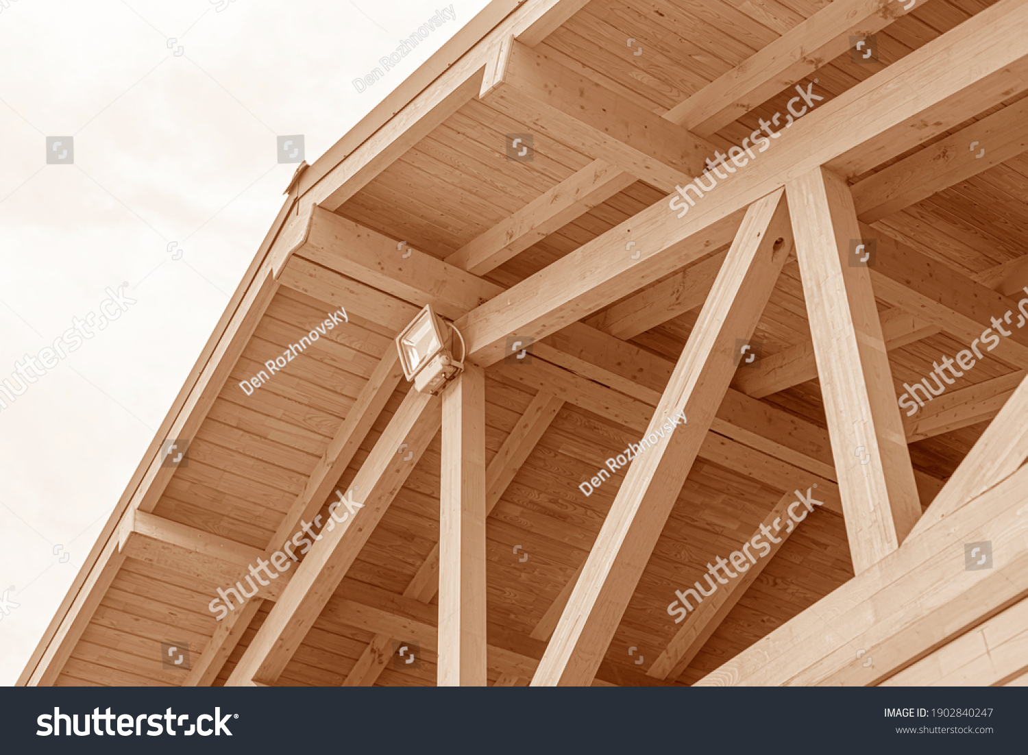 Wooden roof structure. Glued laminated timber roof. Rafters made of wood. #1902840247