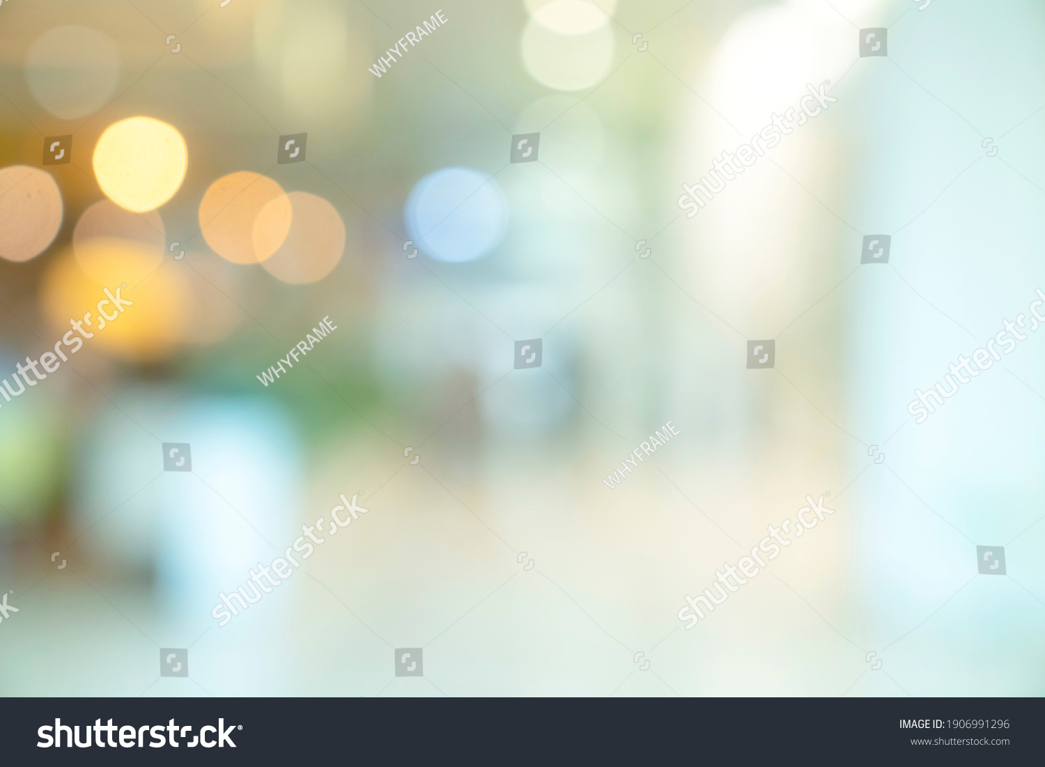 abstract blur image background of shopping mall with light bokeh and flare light bulb #1906991296