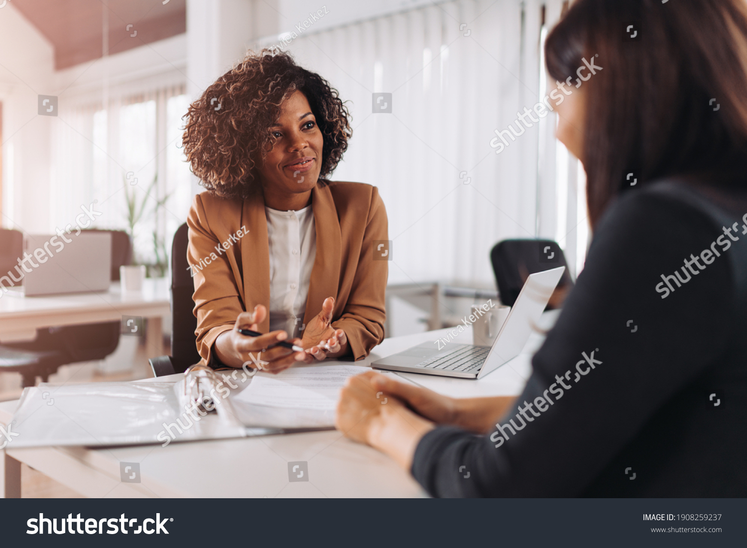 Young woman doing a job interview #1908259237