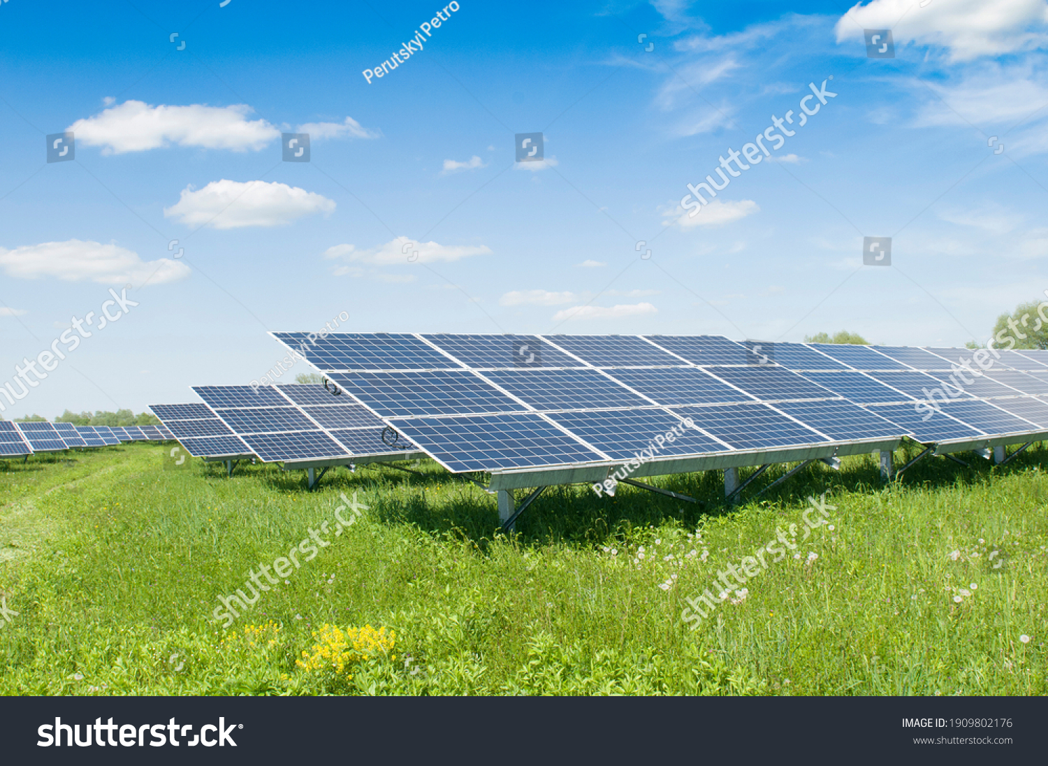 Solar panels and blue sky. Solar panels system power generators from sun. Clean technology for better future #1909802176