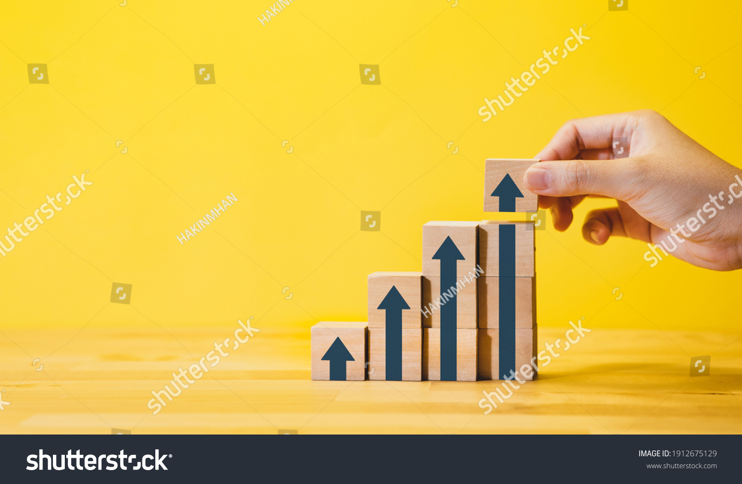 Business growth or step for success concepts with arrow graph, on wood.financial,profit of investment. #1912675129