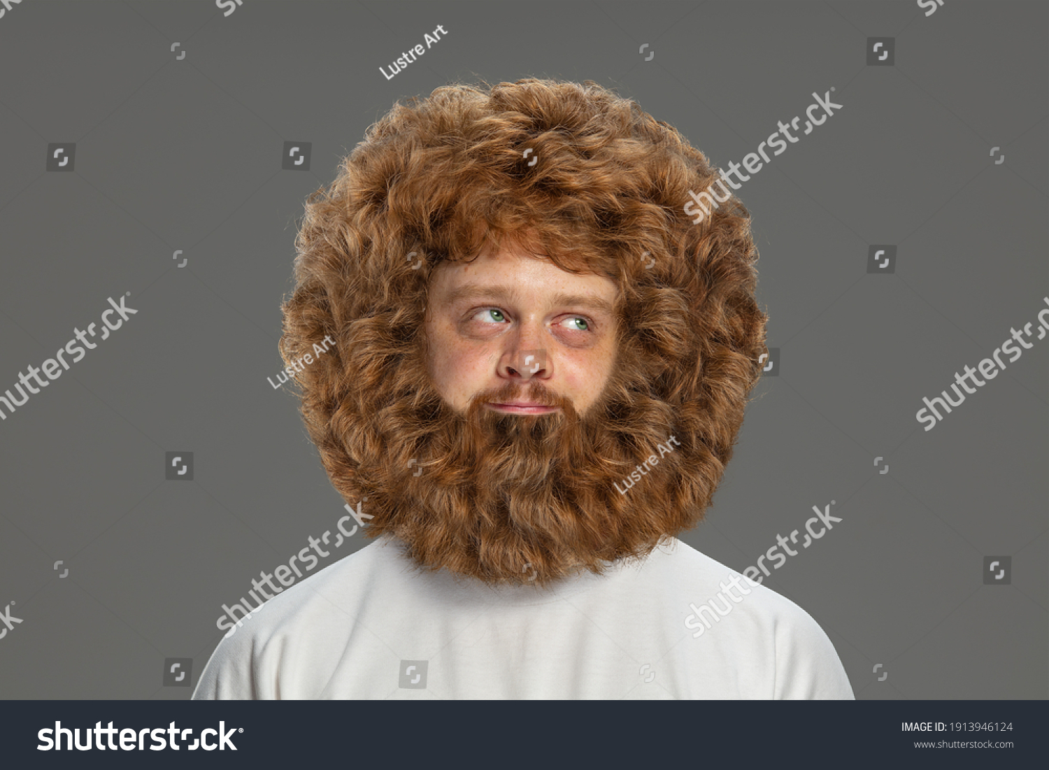 Half-length portrait of young very hairy man isolated over grey background. #1913946124