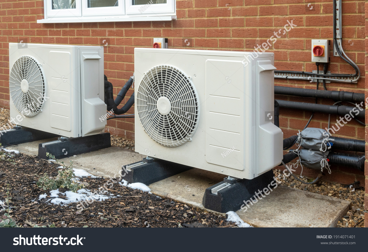 Two air source heat pump units installed on a modern house #1914071401