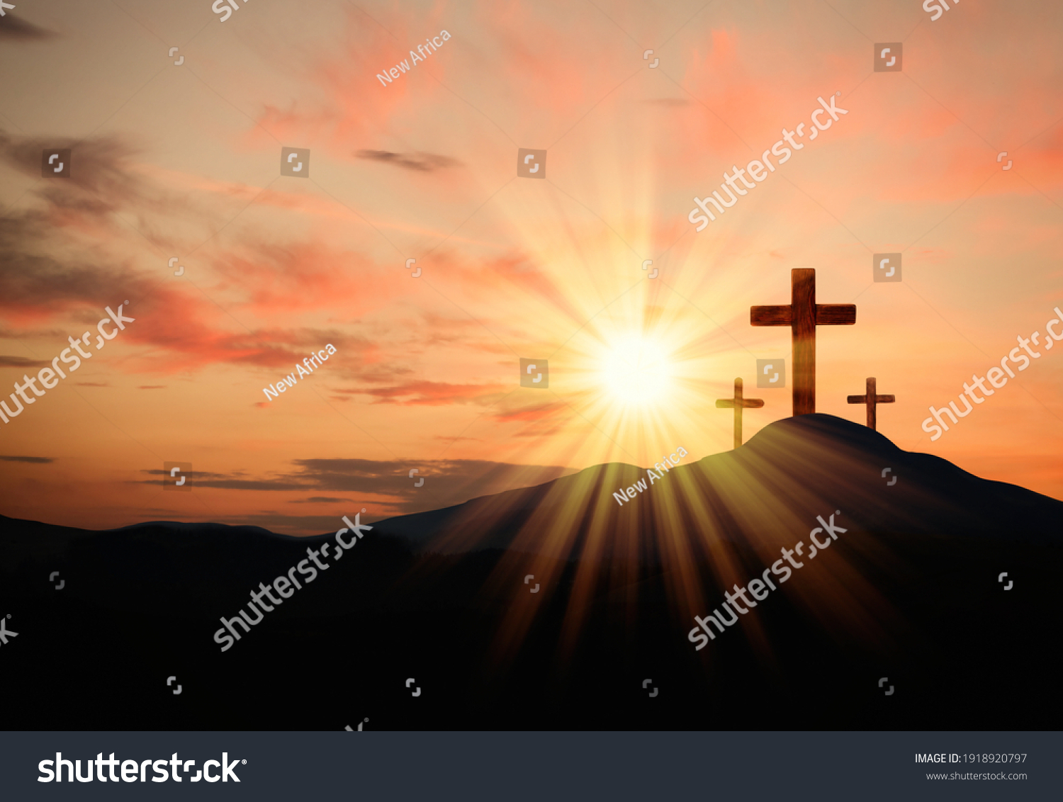Christian crosses on hill outdoors at sunset.  Crucifixion Of Jesus #1918920797
