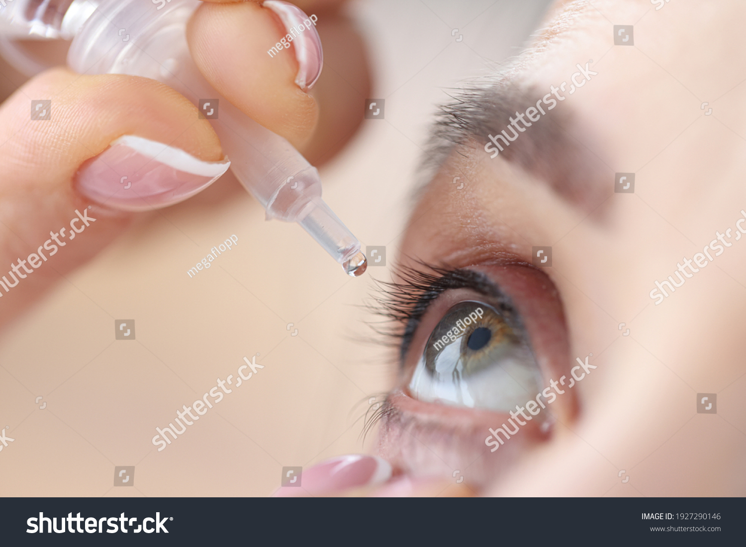 Woman drips eye drops into her eyes. Eye diseases and their treatment concept #1927290146