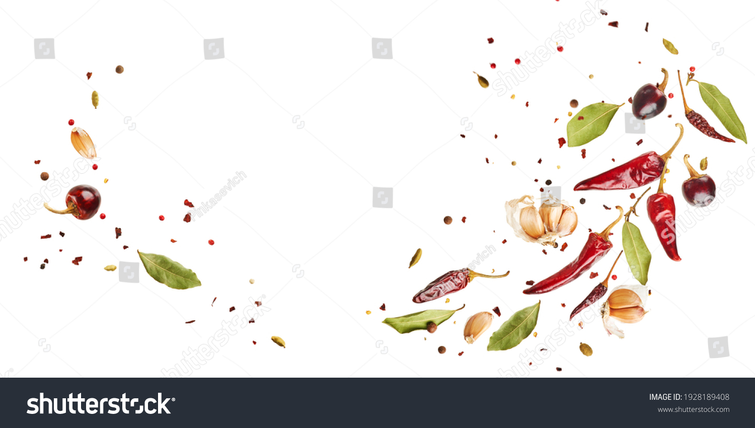 Flying set of colorful spices peppers, chili, garlic, laurel leaf, herbs in the air isolated on white background. Food and cuisine ingredients wide banner, top view, with copy space.  #1928189408