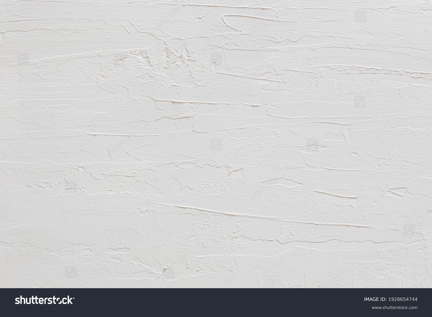 close-up view of a white stucco wall texture #1928654744
