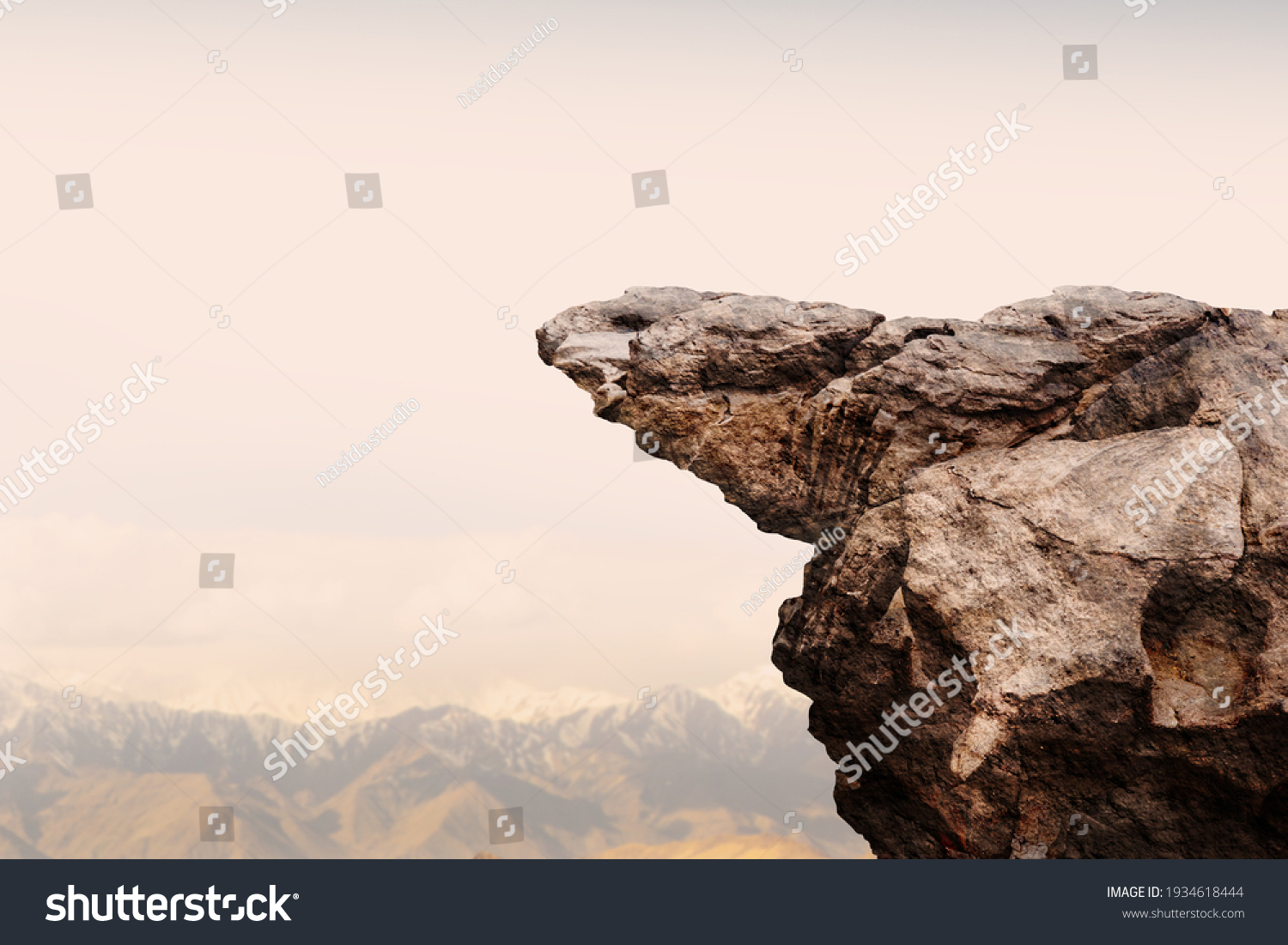 Cliff stone with mountain on clouds sky. #1934618444