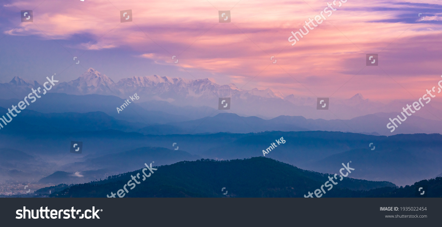 Panoramic landscape of great Himalayas mountain range during an autumn morning from Kausani also known as 'Switzerland of India' a hill station in Bageshwar district, Uttarakhand, India. #1935022454