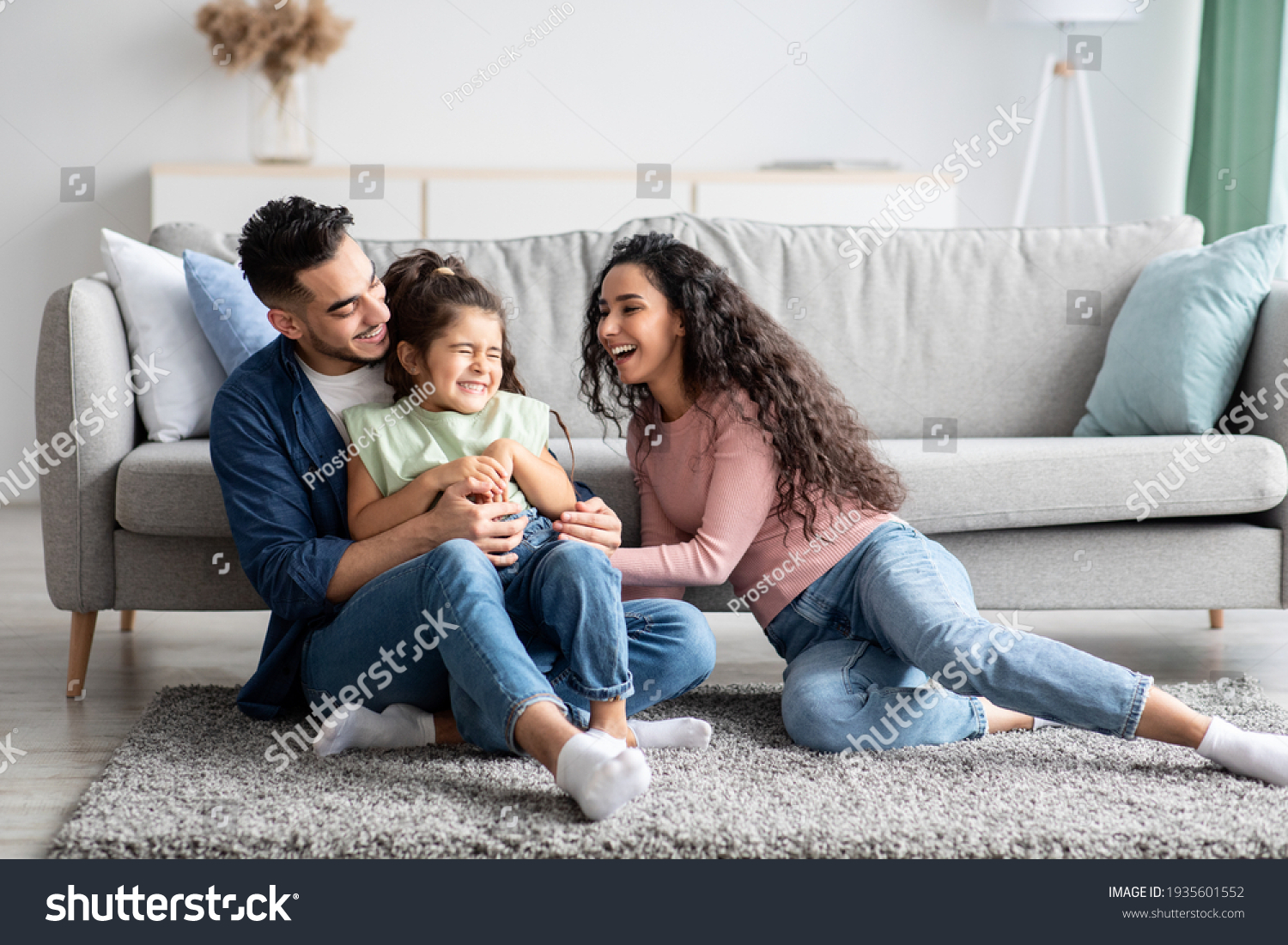 Middle Eastern Parents Having Fun With Their Little Daughter At Home #1935601552