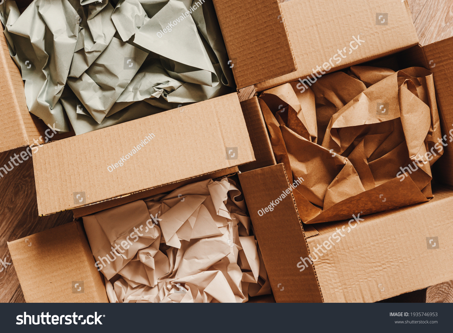 Cardboard boxes with crumpled paper inside for packaging goods from online stores, eco friendly packaging made of recyclable raw materials #1935746953