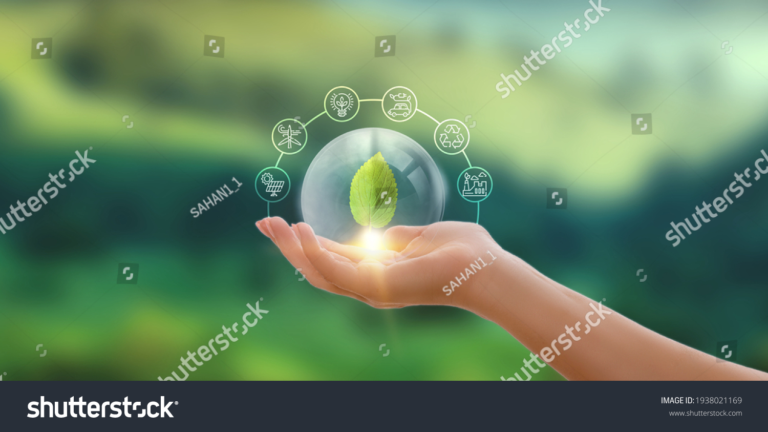 Hand holding green leaf with icons energy sources for renewable, sustainable development. Ecology concept. #1938021169