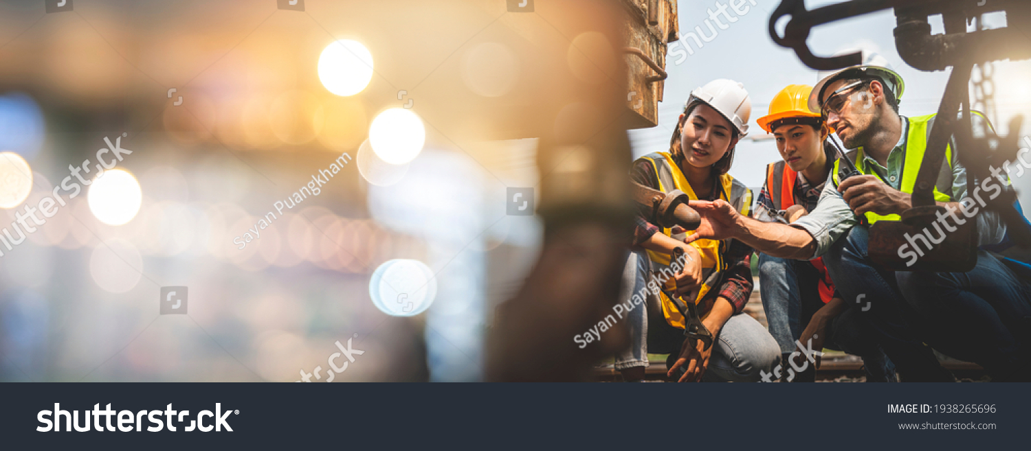 Team engineer use wrench repair train wheel, double exposure with bokeh, banner cover.	 #1938265696