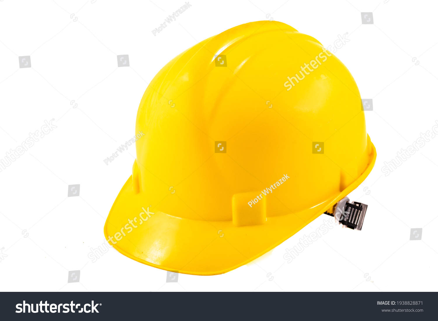 Yellow hard hat for construction workers. Protective clothing and accessories for employees. Light background. #1938828871