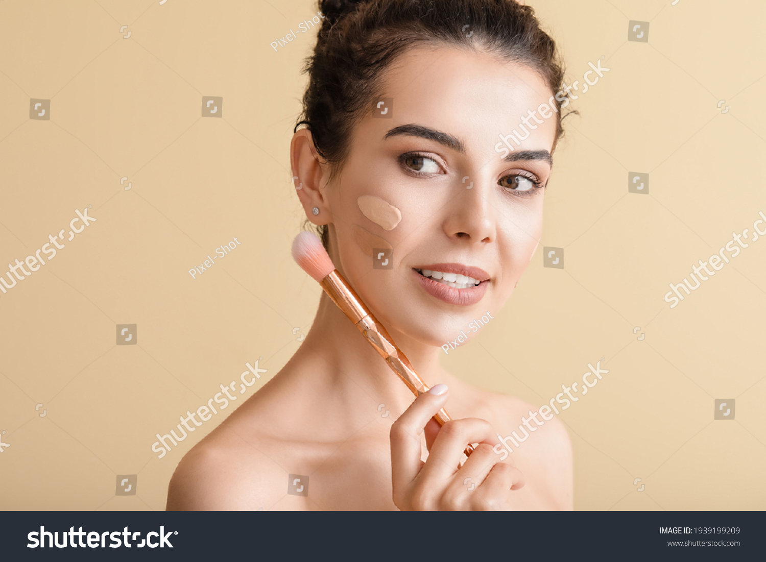 Beautiful young woman with foundation on her face against color background #1939199209