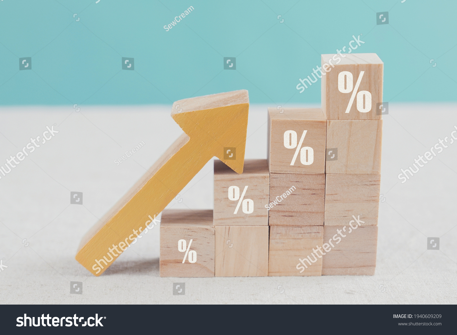 Wooden blocks with percentage sign and arrow up, financial growth, interest rate increase, inflation, sale price and tax rise concept  #1940609209