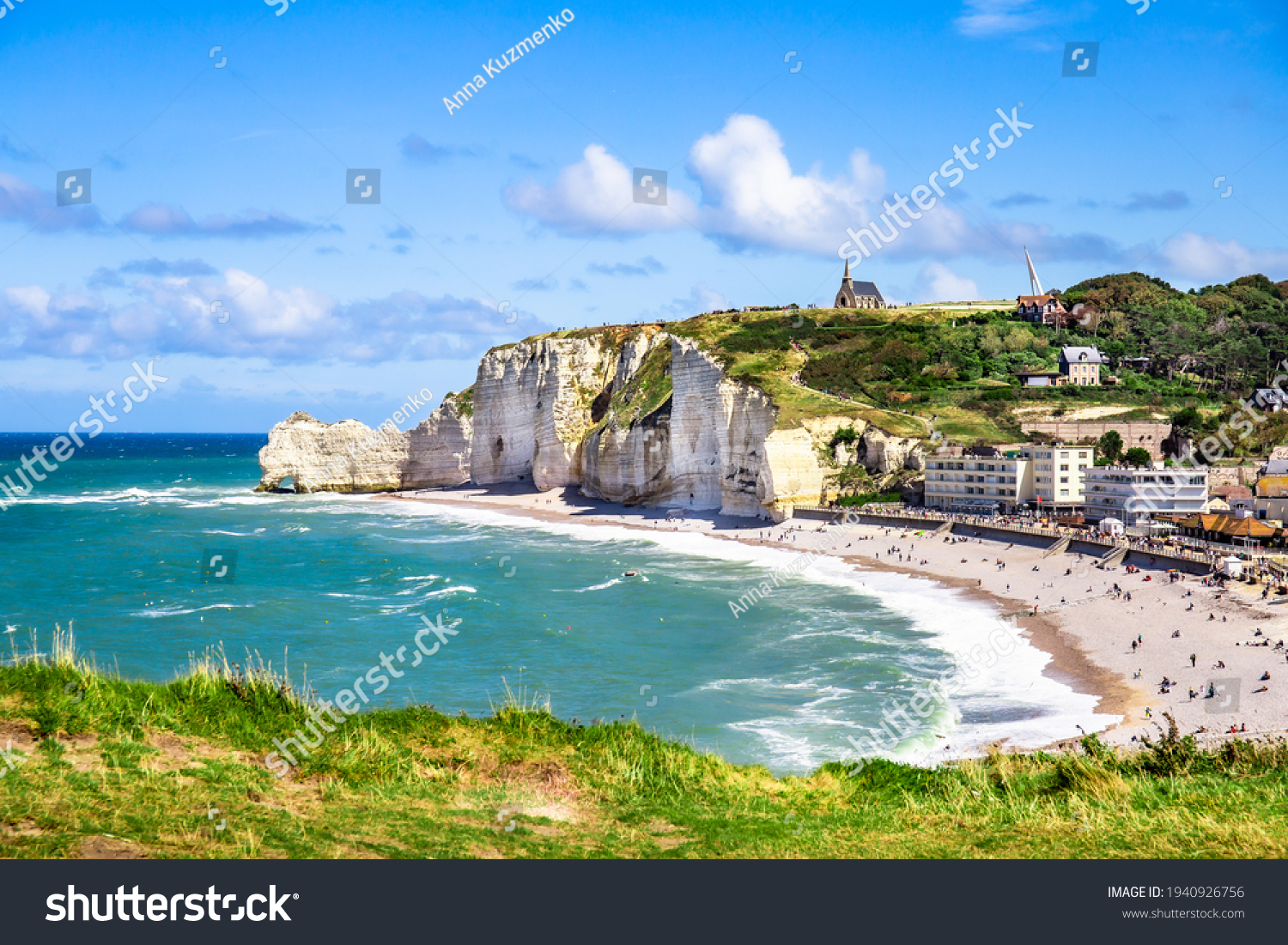 Etretat Aval cliff, rocks and natural arch landmark and blue ocean. Normandy, France, Europe. Beatiful summer panorama. #1940926756