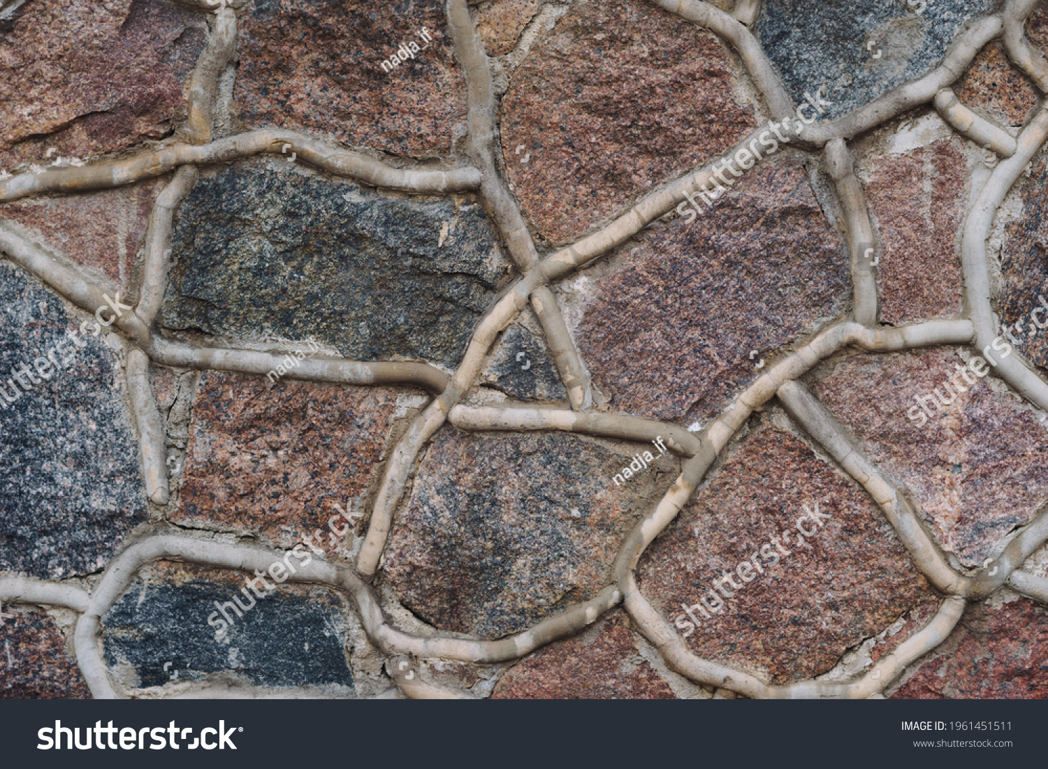 stone pavement with abstract pattern.  #1961451511