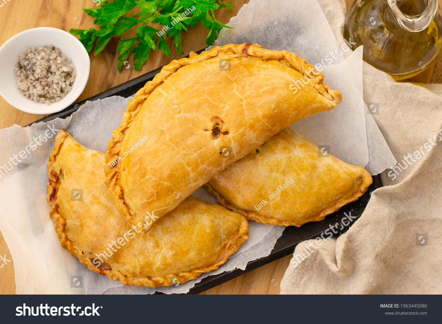 Savoury pastry Cornish pasty filled with chicken and potato #1963445086
