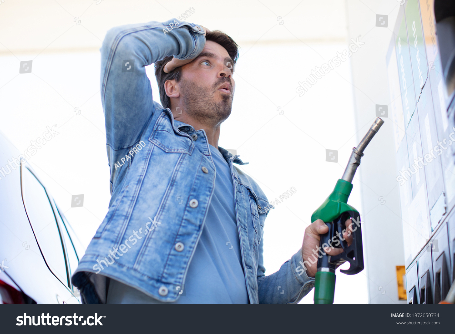 man in shock with gas price #1972050734