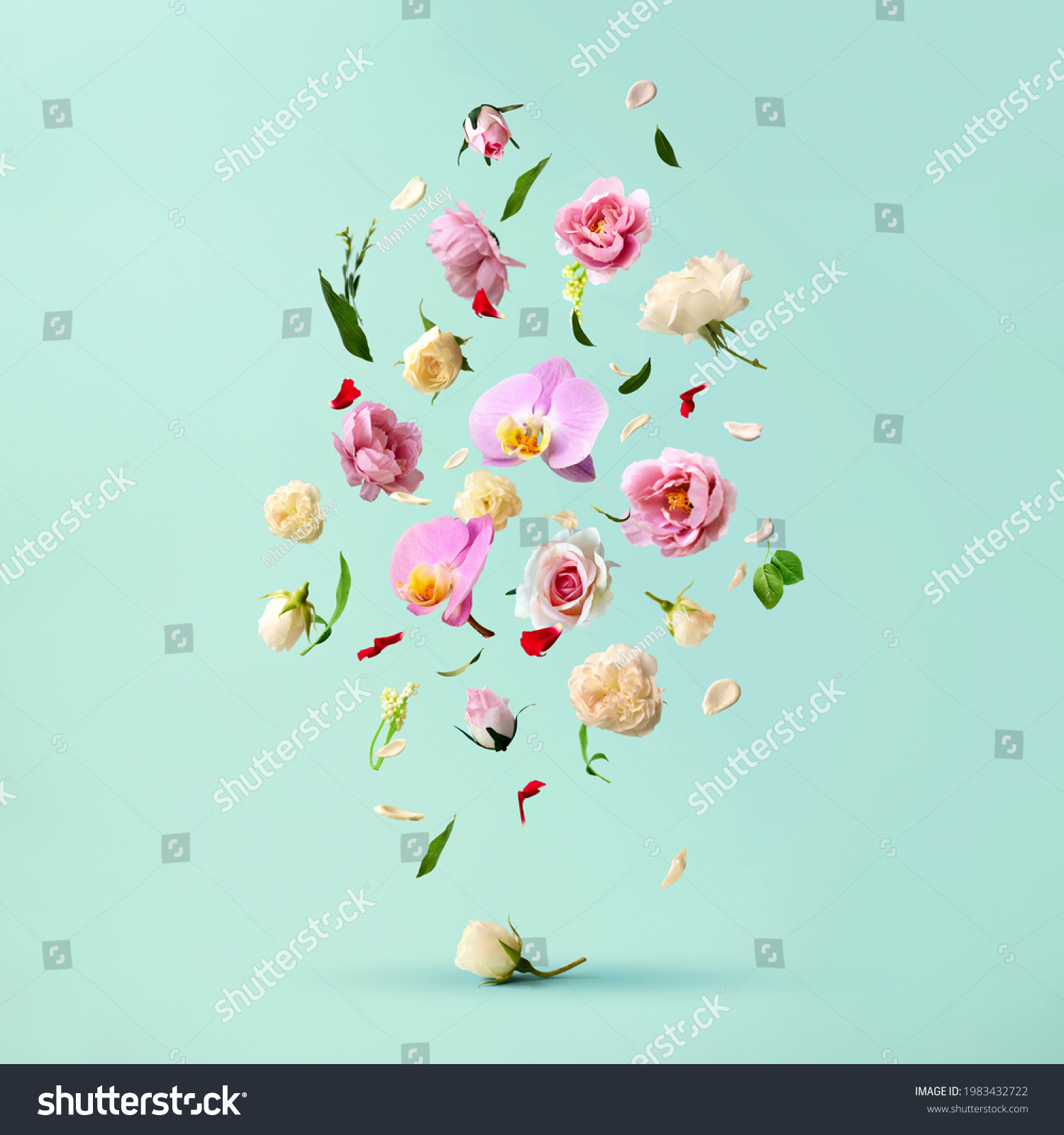 Beautiful spring flowers flying in the air, against teal background; Creative spring floral layout. Minimal birthday, valentines or wedding concept. #1983432722