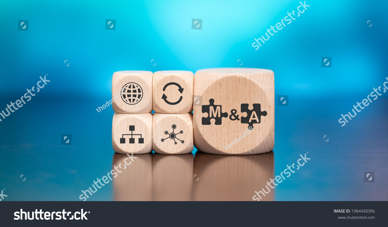 Wooden blocks with symbol of m and a concept on blue background #1984430396