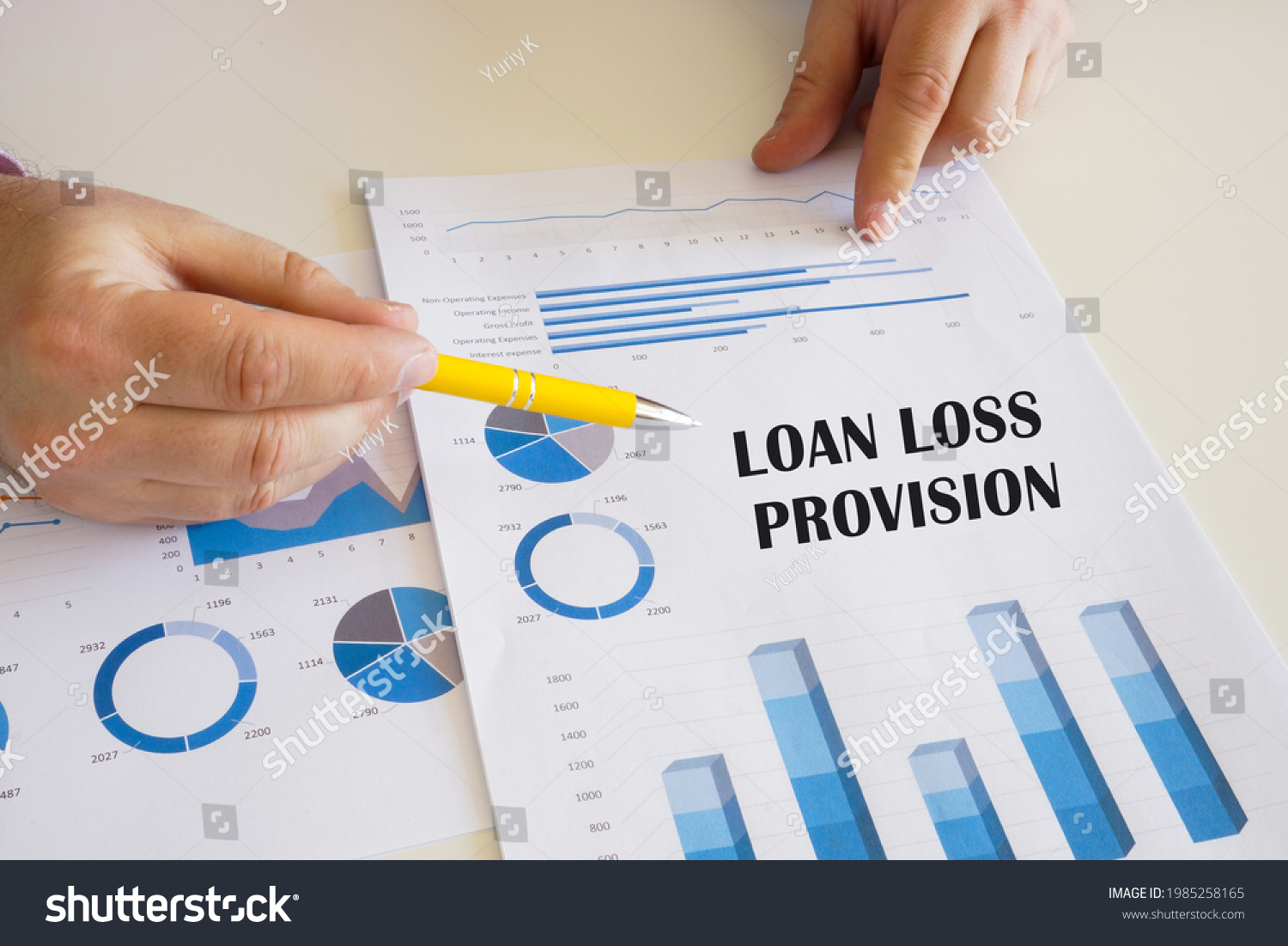 Business concept meaning LOAN LOSS PROVISION with sign on the chart sheet.  #1985258165