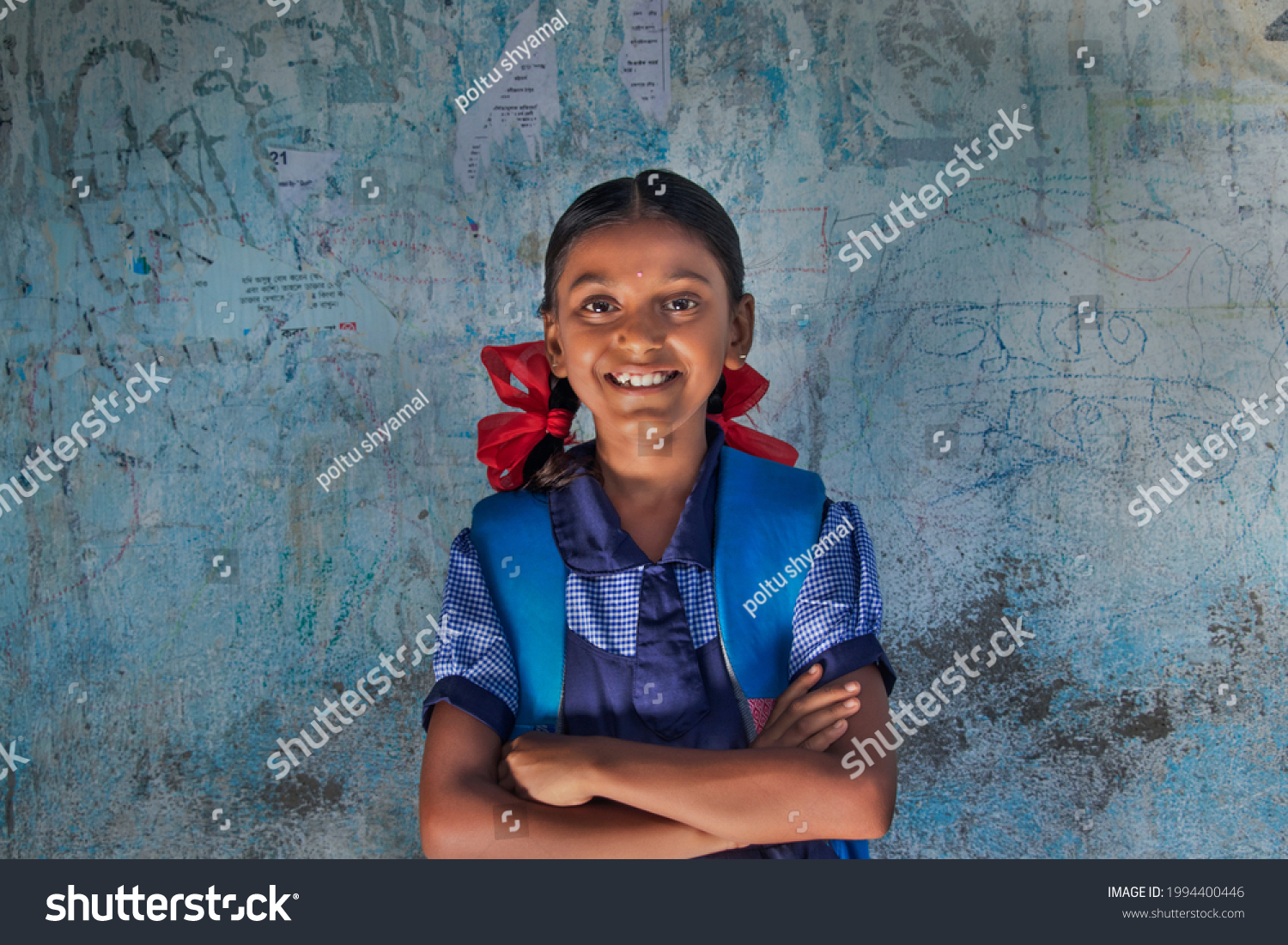 portrait of a rural school girl Smiling and standing in School #1994400446