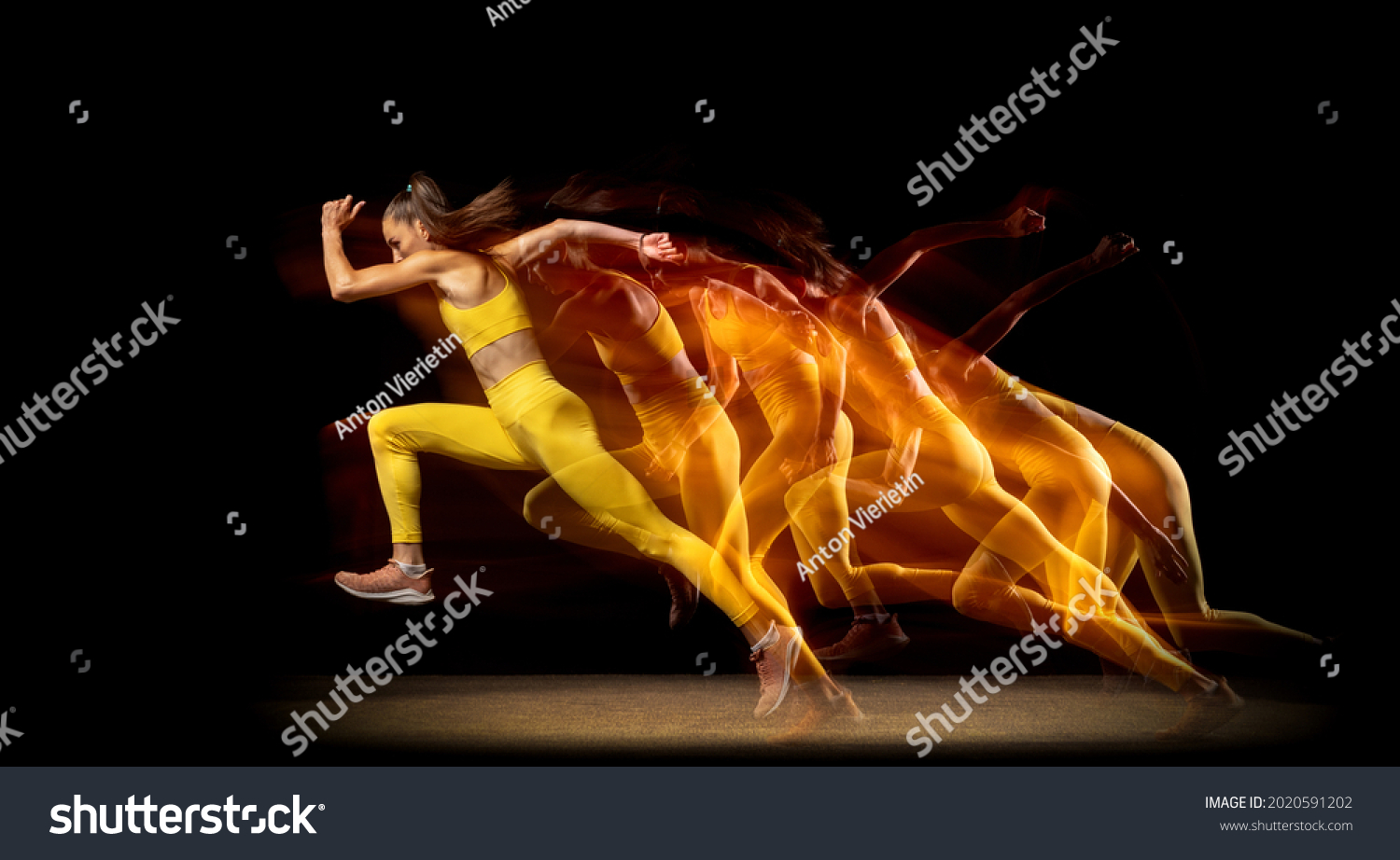 Stroboscopic effect. Young woman, female professional track athlete running isolated over black studio background in mixed neon lights. Concept of sport, healthy lifestyle, motion. Copy space for ad. #2020591202