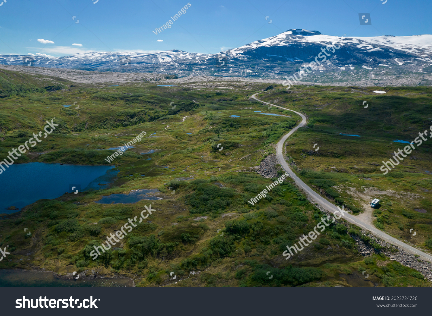 Boondocking Camper Camping in the Norwegian Nordland Territory Saltfjellet-Svartisen National Park. Aerial Scenic Summer Landscape. #2023724726