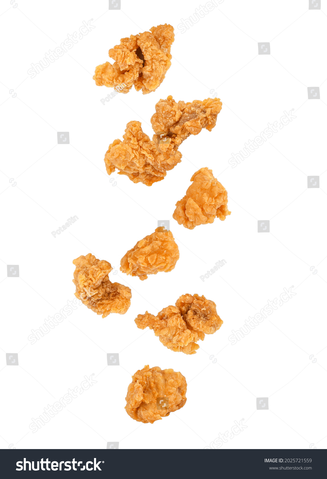 Falling of fried popcorn chicken isolated on white background. #2025721559