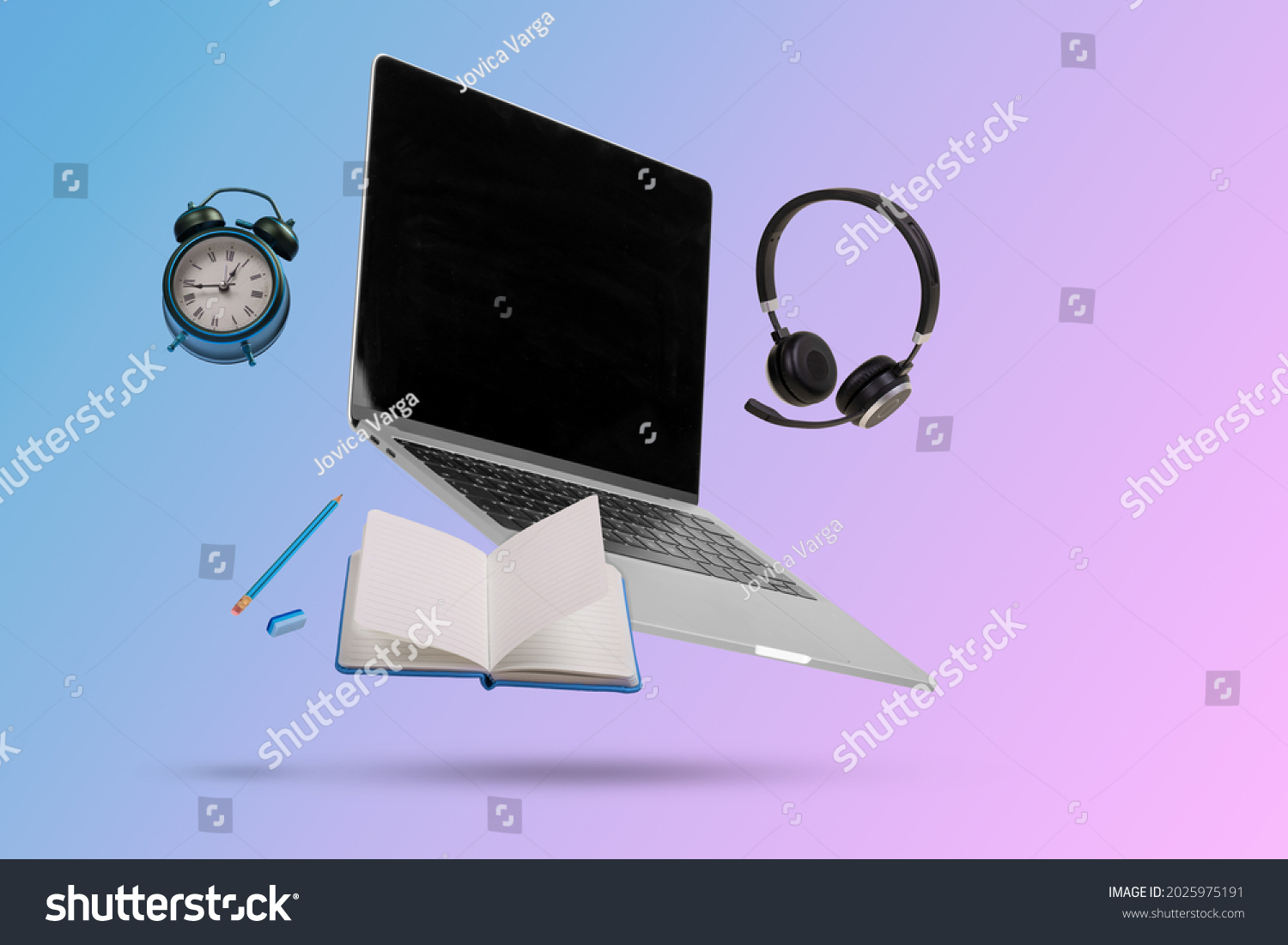 Creative minimal composition made with a laptop, headphones, school supplies and alarm clock  flying in the air. Back to school. Online teaching.  Suitable for advertising, marketing, ads. Copy space #2025975191