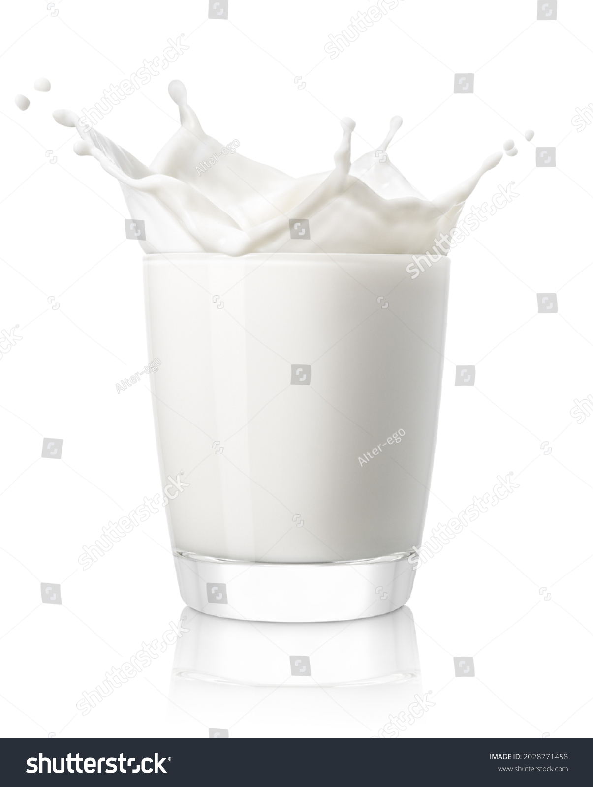 small glass of milk with splash isolated on white background #2028771458