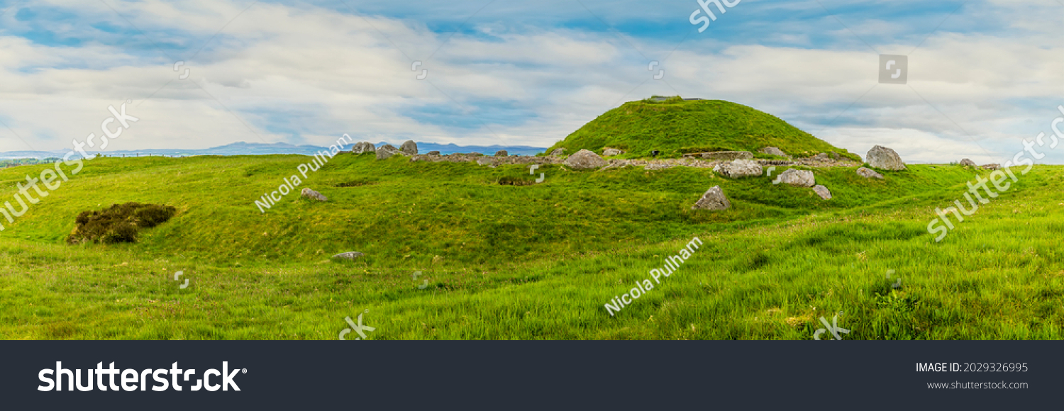 A panorama view across the Cairnpapple Hill burial site in Scotland on a summers day  #2029326995
