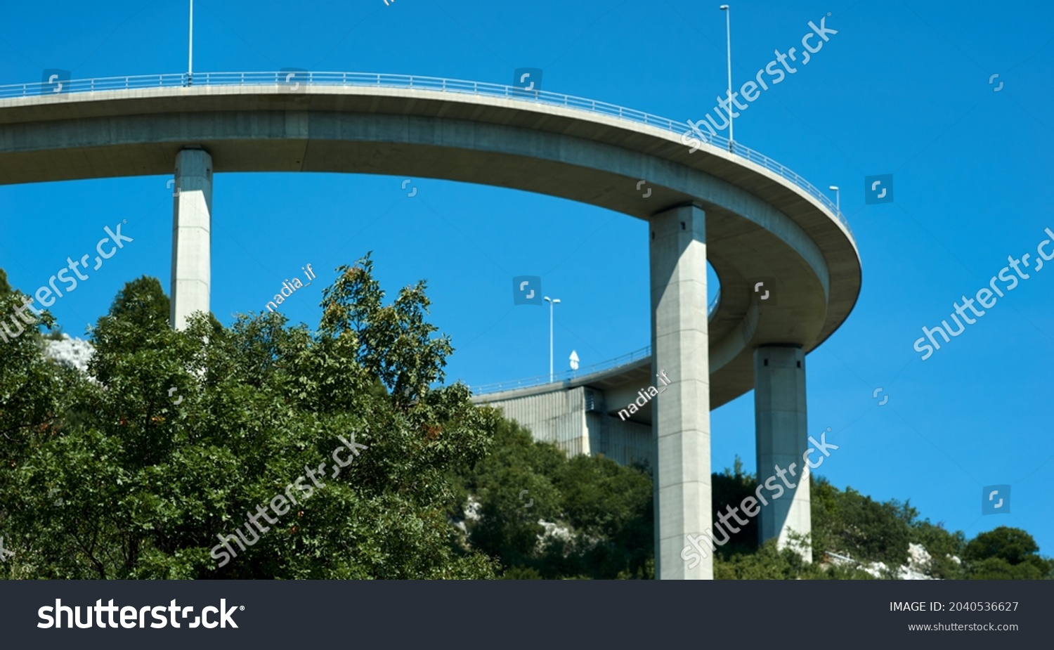 Bridge against the blue sky. Motorway flyover near Krk island in Croatia. Selective focus. High quality photo #2040536627