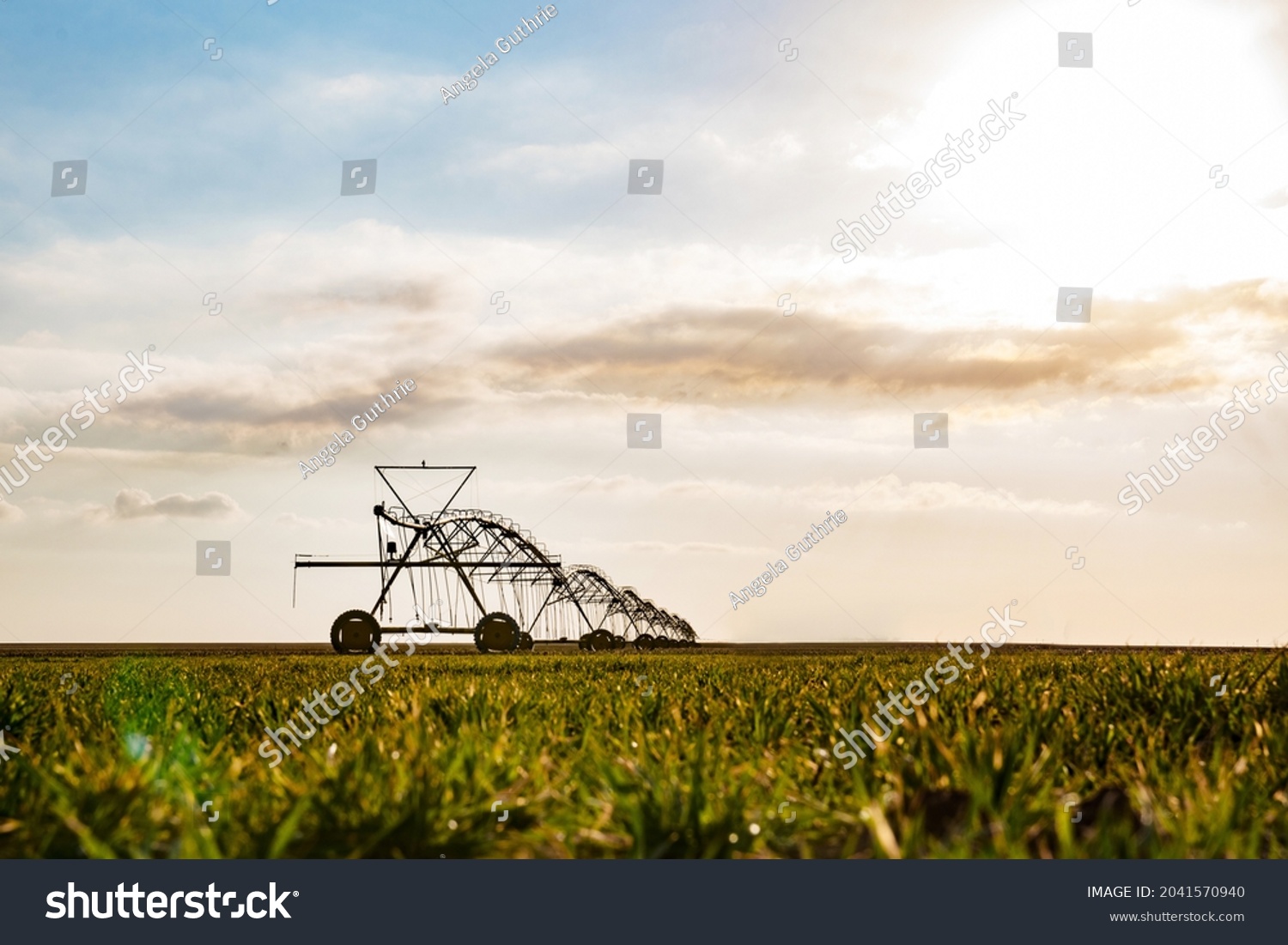 Irrigation equipment in green field #2041570940