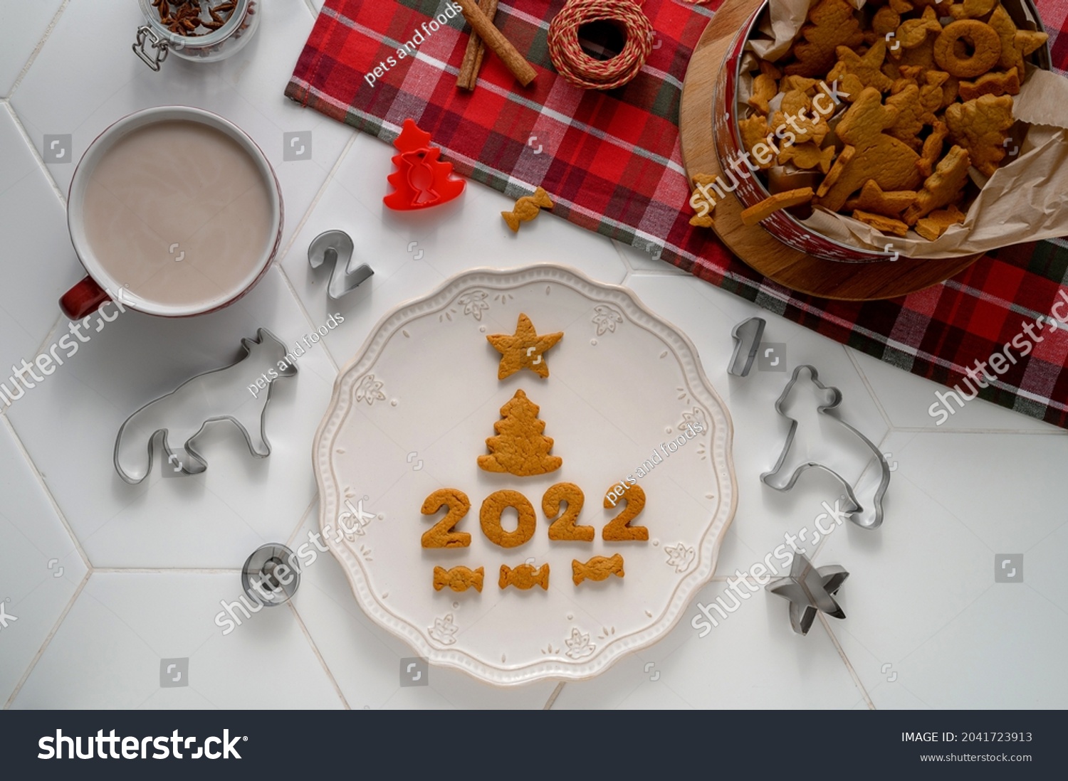 cooking gingerbread cookies and the number of the year 2022 #2041723913