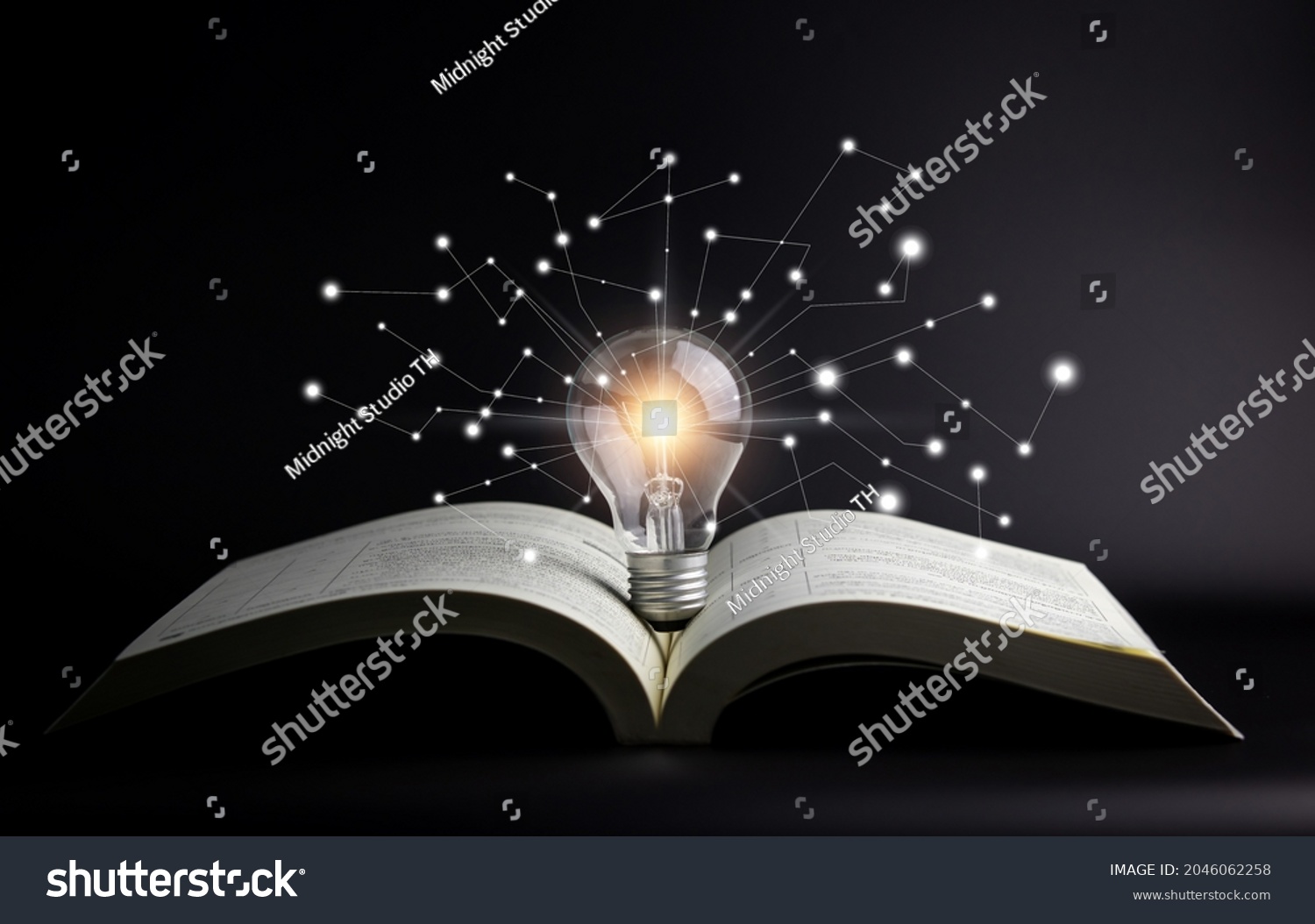 Light bulbs and books. Concept of reading books, knowledge, and searching for new ideas. Innovation and inspiration, Creativity with twinkling lights, the inspiration of ideas. #2046062258