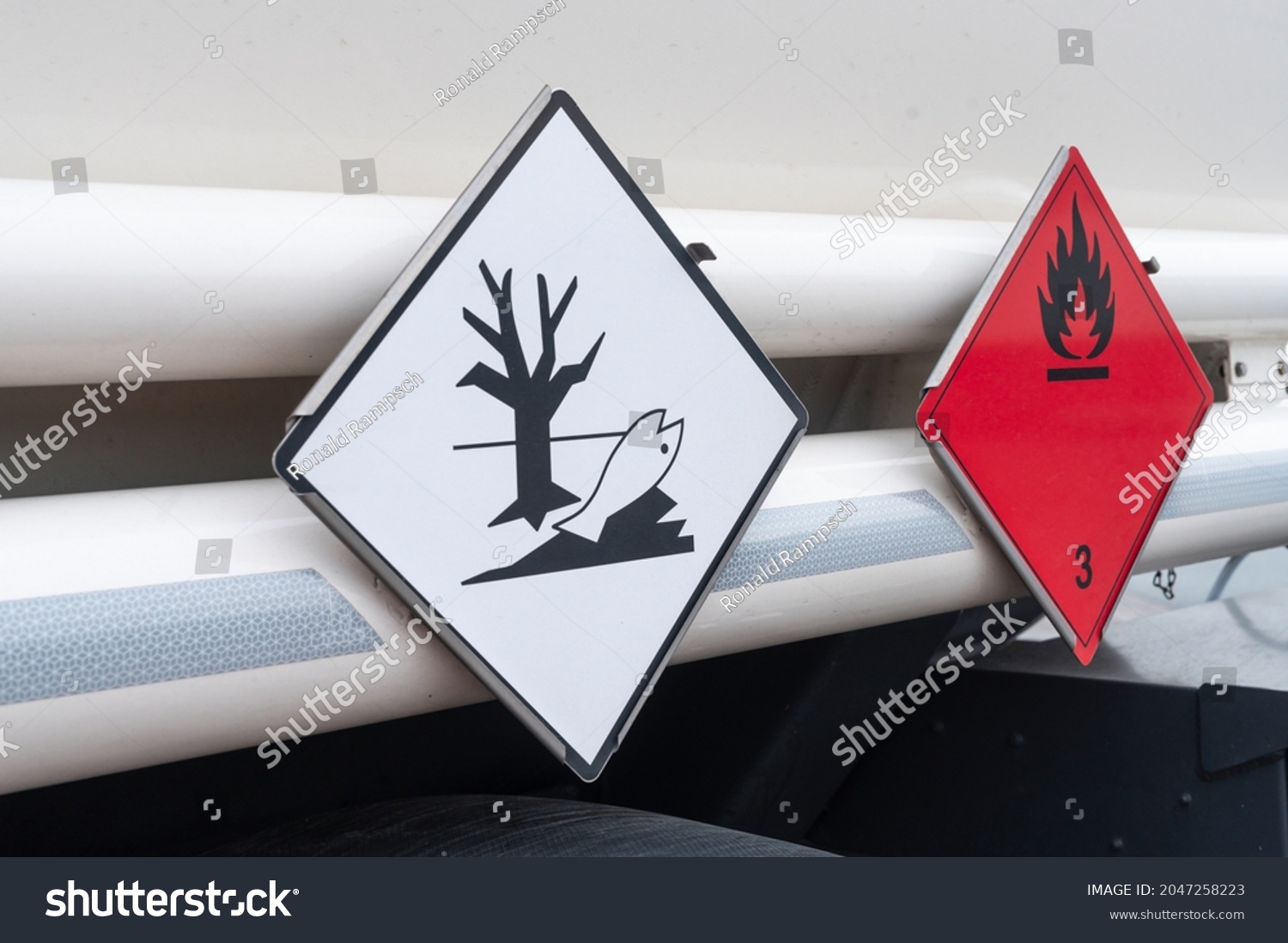 Signs for the dangerous goods classes , here for environmentally hazardous and flammable liquid substances #2047258223