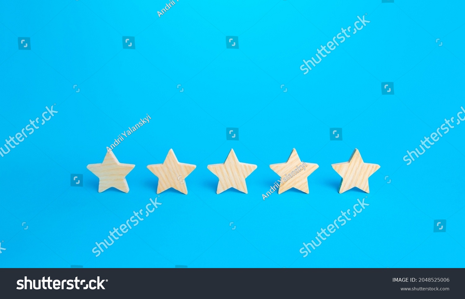 Five stars on a blue background. Rating evaluation concept. High satisfaction. Good reputation. Popularity rating of restaurants, hotels or mobile applications. Highest score. Service quality feedback #2048525006