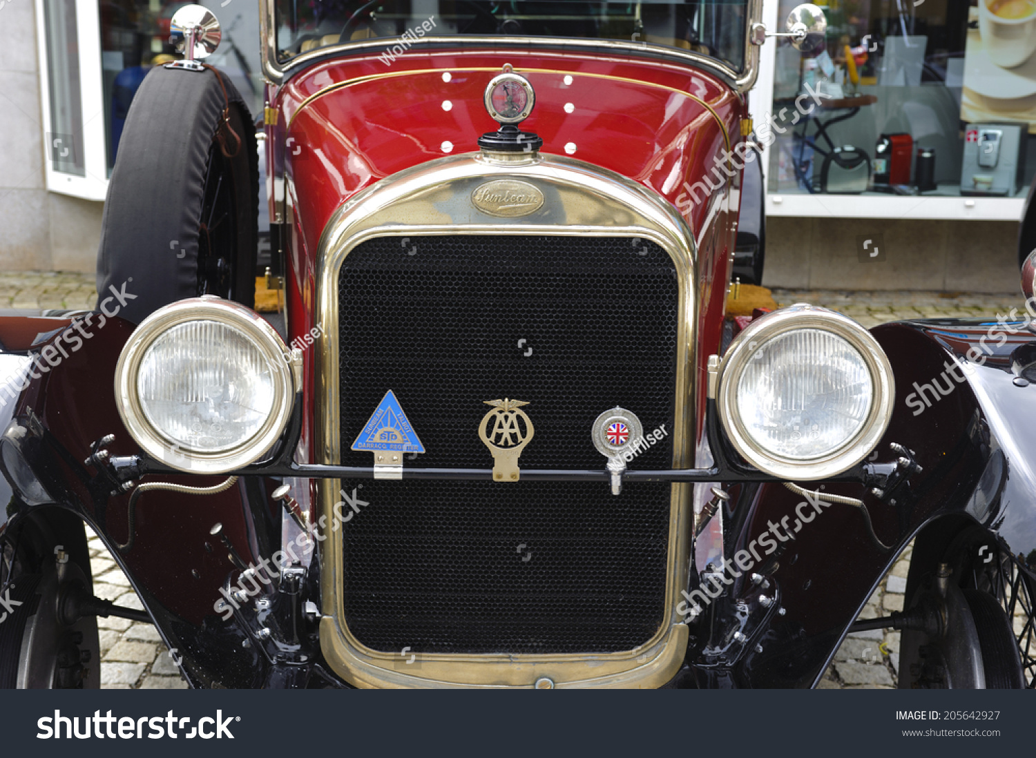 LANDSBERG, GERMANY - JULY 12, 2014: Public oldtimer rally in Bavarian city Landsberg for at least 80 years old veteran cars with a front view of Sunbeam 25 HP, built at year 1926 #205642927