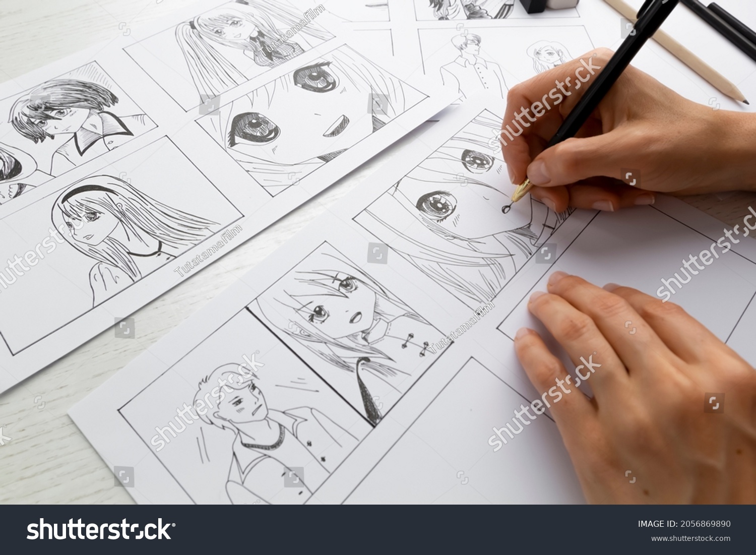 An artist draws a storyboard of an anime comics book. Manga style. #2056869890
