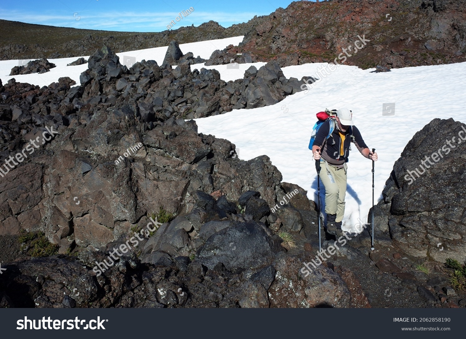 Trekking Villarrica traverse hiking trail, Solidified lava field with snow in Villarrica national park in Chile #2062858190